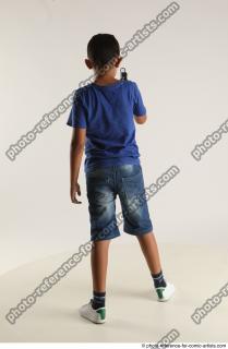 TIMBO STANDING POSE WITH GUN